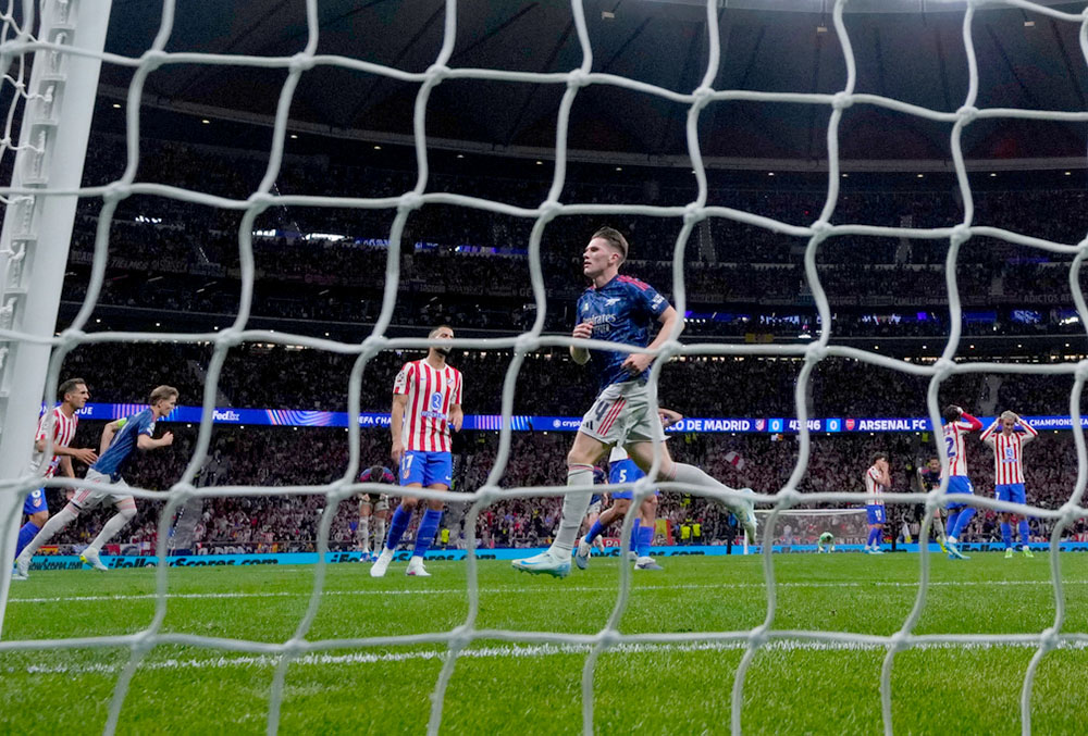 Arsenal's Viktor Gyokeres celebrates after scoring his sides first goal during a Champions League semifinal, first leg, soccer match between Atletico Madrid and Arsenal in Madrid, Spain.