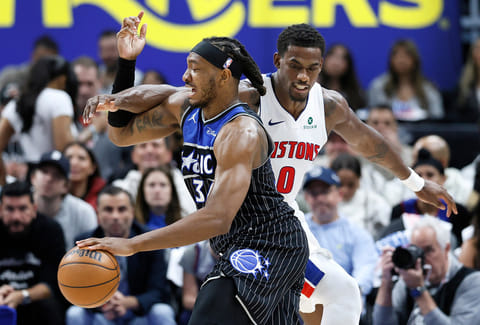 Orlando Magic center Wendell Carter Jr. (34) tries driving to the basket against Detroit Pistons center Jalen Duren (0) during the first half in Game 5 of a first-round NBA basketball playoffs series in Detroit. 