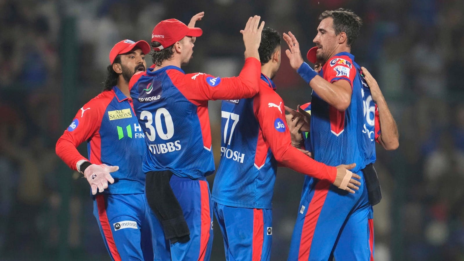 Delhi Capitals' Mitchell Starc, right, celebrates with teammates after the dismissal of Rajasthan Royals' Dhruv Jurel during their Indian Premier League 2025 match. - File/AP