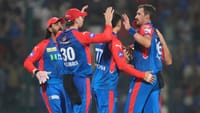 File/AP : Delhi Capitals' Mitchell Starc, right, celebrates with teammates after the dismissal of Rajasthan Royals' Dhruv Jurel during their Indian Premier League 2025 match.