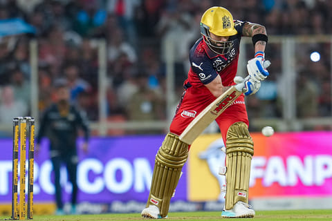 Royal Challengers Bengaluru's Virat Kohli plays a shot during the Indian Premier League (IPL) 2026 T20 cricket match between Gujarat Titans and Royal Challengers Bengaluru, in Ahmedabad, Gujarat.