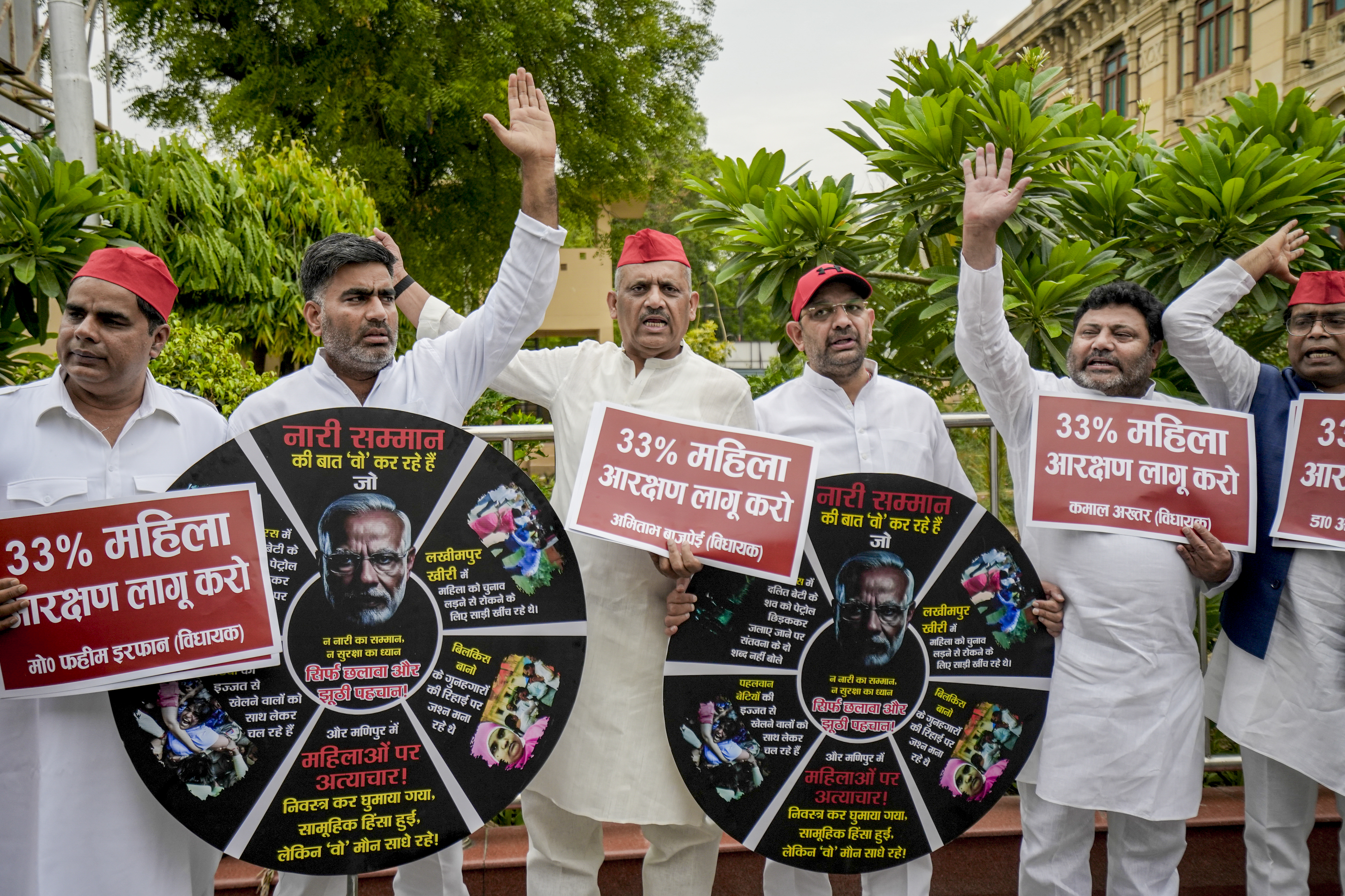 Samajwadi Party leaders stage a protest, accusing the BJP of misleading the people on the issue of women's reservation, during the special one-day session of the Uttar Pradesh Assembly, in Lucknow - PTI