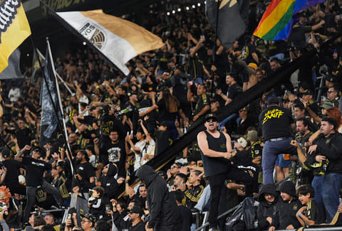 Fans celebrate a goal by LAFC midfielder Timothy Tillman during the second half of the first leg of a CONCACAF Champions Cup semifinal soccer match against Toluca in Los Angeles.