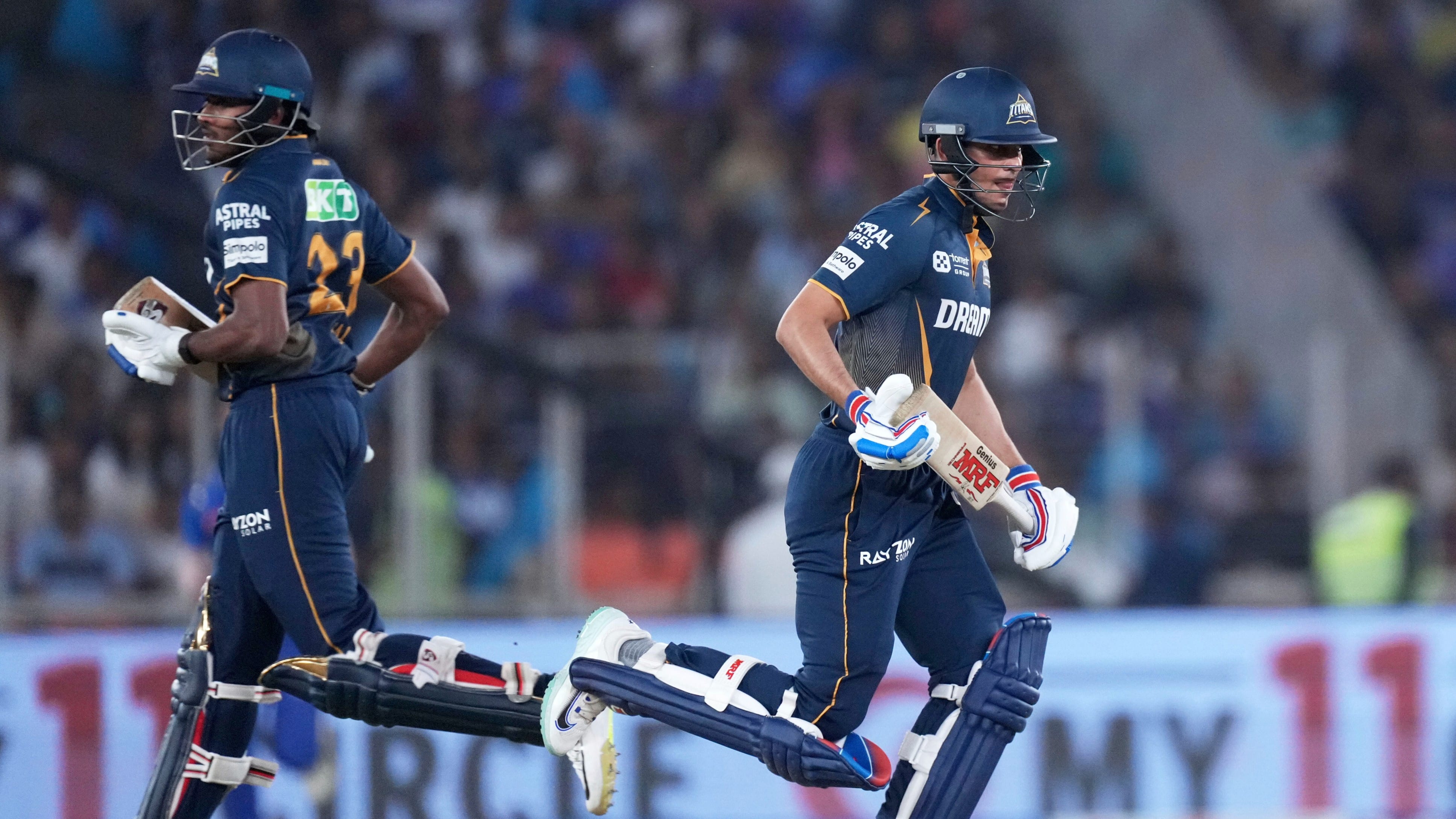 Gujarat Titans' captain Shubman Gill, right, and batting partner Sai Sudharsan run between the wickets during their Indian Premier League match against Mumbai Indians at Narendra Modi Stadium in Ahmedabad.
 - Photo: AP

