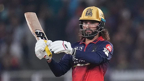 AP Photo/Ajit Solanki : Royal Challengers Bengaluru's captain Rajat Patidar plays a shot during the Indian Premier League cricket match between Gujarat Titans and Royal Challengers Bengaluru in Ahmedabad, India, Thursday, April 30, 2026. (AP Photo/Ajit Solanki)