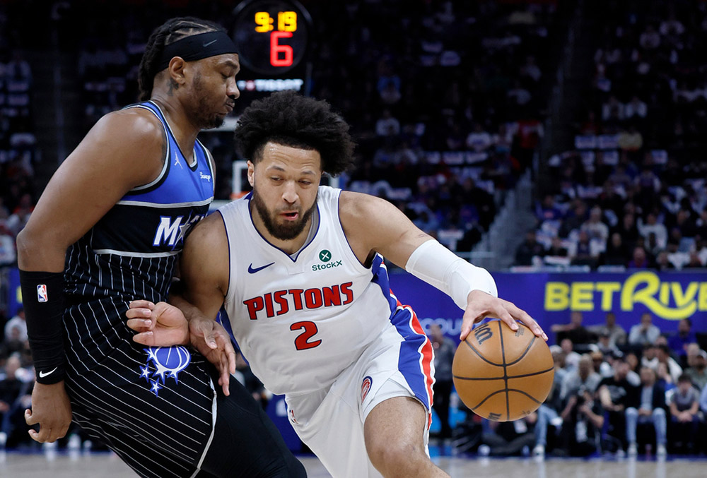 Detroit Pistons guard Cade Cunningham (2) drives against Orlando Magic center Wendell Carter Jr. (34) during the first half in Game 5 of a first-round NBA basketball playoffs series in Detroit.  - | Photo: AP/Duane Burleson