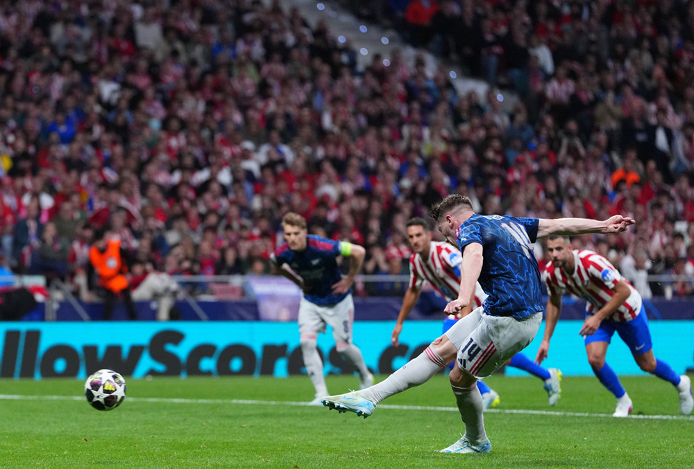 Arsenal's Viktor Gyokeres scores from a penalty shot during a Champions League semifinal, first leg, soccer match between Atletico Madrid and Arsenal in Madrid, Spain.
