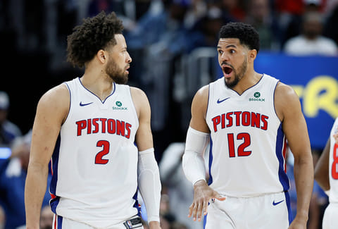 Detroit Pistons forward Tobias Harris (12) reads to a basket scored against the Orlando Magic by guard Cade Cunningham (2) during the second half in Game 5 of a first-round NBA basketball playoffs series in Detroit.
