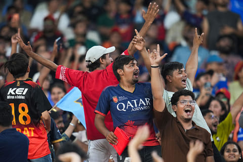 Crowd cheers during the Indian Premier League (IPL) 2026 T20 cricket match between Gujarat Titans and Royal Challengers Bengaluru, in Ahmedabad, Gujarat.