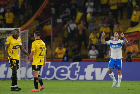 Fernando Zampedri of Chile's Universidad Catolica, right, celebrates scoring his side's opening goal against Ecuador's Barcelona during a Copa Libertadores Group D soccer match in Guayaquil, Ecuador.