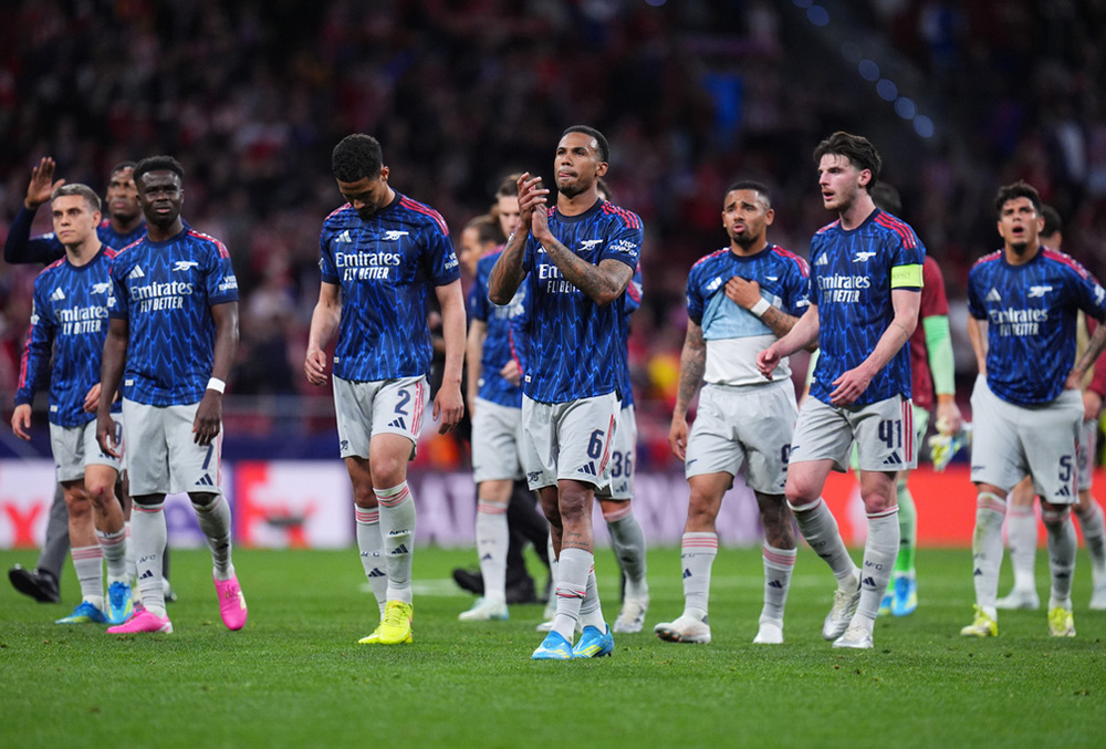 Arsenal's Gabriel and his teamamtes greet fans after a Champions League semifinal, first leg, soccer match between Atletico Madrid and Arsenal in Madrid, Spain.