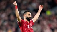 | Photo: AP/Jon Super : Liverpool's Mohamed Salah celebrates scoring his side's fourth goal  during the second leg of the Champions League round of 16 soccer match between Liverpool and Galatasaray, in Liverpool, England.