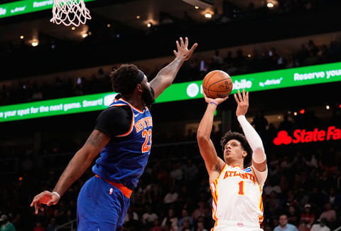 Atlanta Hawks forward Jalen Johnson (1) shoots against New York Knicks center Mitchell Robinson (23) in the first half during Game 6 in a first-round NBA basketball playoffs series in Atlanta.