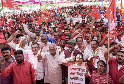 Workers and members of various trade unions take part in a rally on International Labour Day, also known as May Day, in Bengaluru, Karnataka.