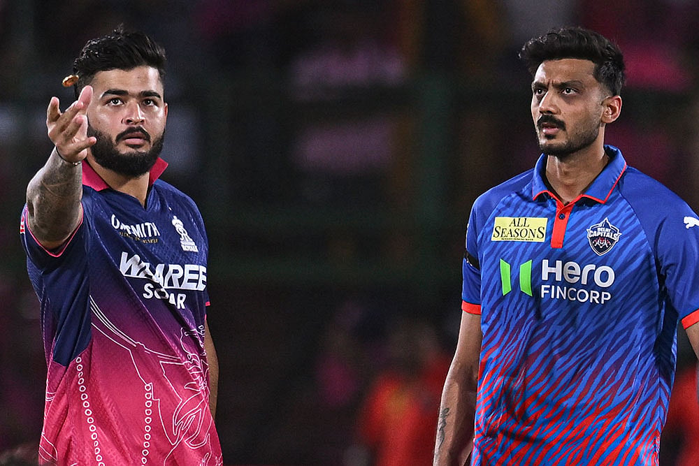 Rajasthan Royals' captain Riyan Parag, left, and Delhi Capitals' captain Axar Patel during the toss before an Indian Premier League (IPL) 2026 T20 cricket match between Rajasthan Royals and Delhi Capitals, in Jaipur. - Photo: PTI 