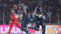 | Photo: AP/Ajit Solanki : Gujarat Titans' Washington Sundar, right, and Jos Buttler run between the wickets during the Indian Premier League cricket match between Gujarat Titans and Royal Challengers Bengaluru in Ahmedabad, India.