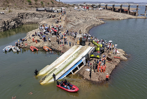 NDRF and other rescue personnel conduct an operation to recover the cruise boat, carrying 29 passengers and two crew members, that overturned in Bargi Dam due to a sudden storm, in Jabalpur district, Madhya Pradesh. The death toll rose to nine and 28 others were rescued after the incident. 