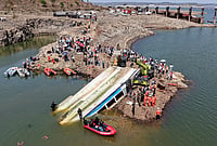 MP Bargi Dam boat tragedy: Death toll rises to nine, six still missing | Photo: PTI : NDRF and other rescue personnel conduct an operation to recover the cruise boat, carrying 29 passengers and two crew members, that overturned in Bargi Dam due to a sudden storm, in Jabalpur district, Madhya Pradesh. The death toll rose to nine and 28 others were rescued after the incident.