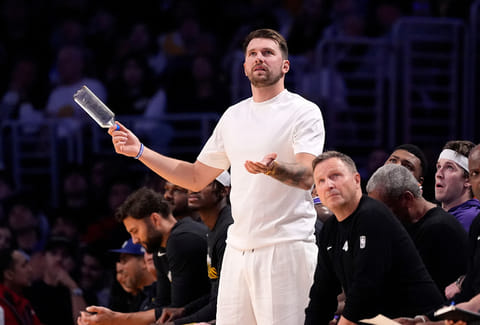 Los Angeles Lakers' Luka Doncic reacts from the bench after the Lakers were called for a foul during the second half in Game 5 of a first-round NBA playoffs basketball series against the Houston Rockets in Los Angeles. 