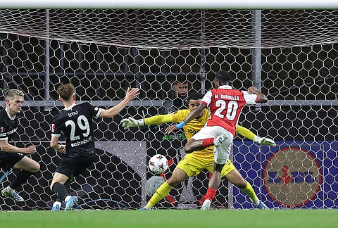Braga's Mario Dorgeles scores his side's second goal during the Europa League semifinal, first leg, soccer match between SC Braga and Freiburg in Braga, Portugal.