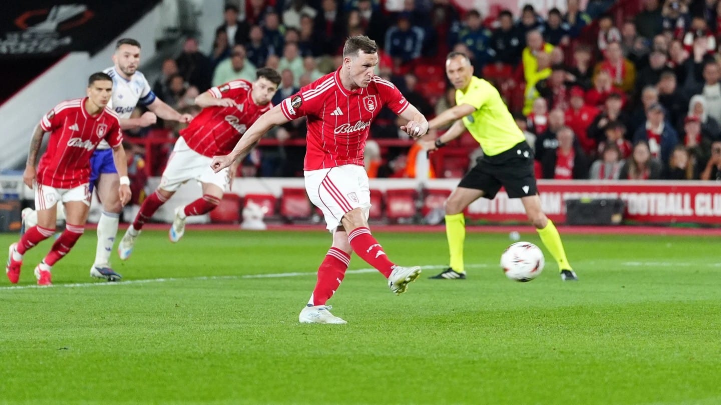 Forest strike Chris Wood scores from the spot to hand his side the lead in the UEL semi-final 1st leg. - AP