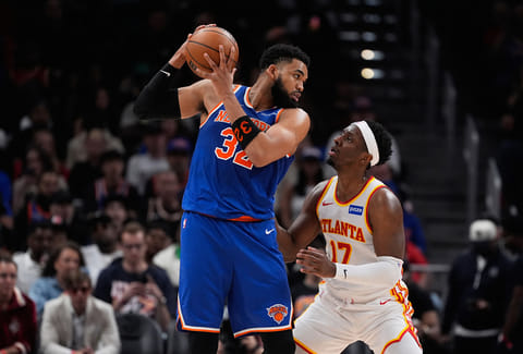 New York Knicks center Karl-Anthony Towns (32) blocks Atlanta Hawks forward Onyeka Okongwu (17) in the first half during Game 6 in a first-round NBA basketball playoffs series in Atlanta. 