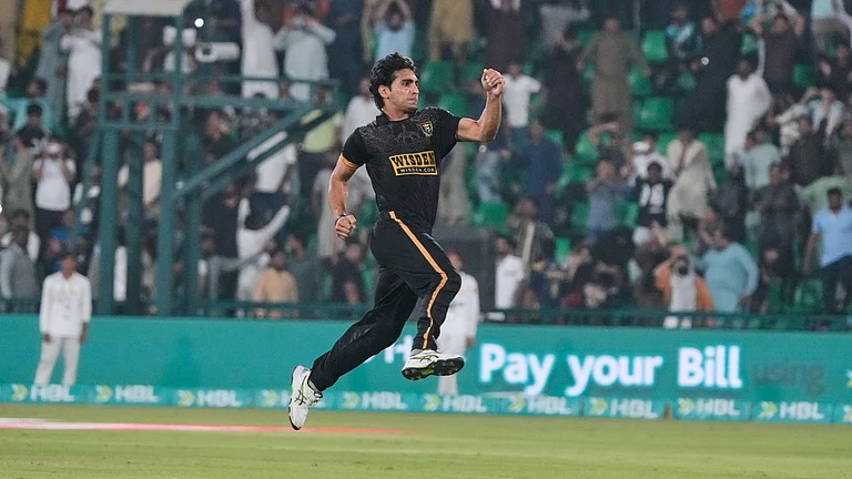 Hyderabad Kingsmen's Hunain Shah celebrates after his team won the Pakistan Super League Eliminator 2 against Islamabad United in Lahore. - AP