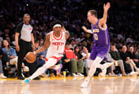 Los Angeles Lakers 93-99 Houston Rockets, NBA 2026 Playoffs: Rockets Stay Alive with Second Straight Win | Photo: AP/Mark J. Terrill : Houston Rockets guard Amen Thompson, left, drives by Los Angeles Lakers guard Luke Kennard during the second half in Game 5 of a first-round NBA playoffs basketball series in Los Angeles.