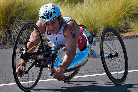 In this Saturday, Oct. 10, 2015 file photo, Alex Zanardi, of Italy, rides during the cycling portion of the Ironman World Championship Triathlon, in Kailua-Kona, Hawaii. ()