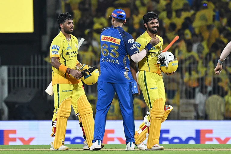 Chennai Super Kings' captain Ruturaj Gaikwad, right, is congratulated by Mumbai Indians' Suryakumar Yadav after Chennai Super Kings won the Indian Premier League cricket match between against Mumbai Indians in Chennai, India. - | Photo: AP