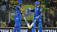 CSK Vs MI Toss Update, IPL 2026: Mumbai Indians Bowling First - Check Playing XI | Photo: AP : Mumbai Indians' Ryan Rickelton, right, and batting partner Naman Dhir touch gloves during the Indian Premier League cricket match between Chennai Super Kings and Mumbai Indians in Chennai, India.