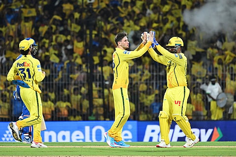 Chennai Super Kings' Noor Ahmad, center, celebrates with teammate Sanju Samson the wicket of Mumbai Indians' Ryan Rickelton during the Indian Premier League cricket match between Chennai Super Kings and Mumbai Indians in Chennai, India.