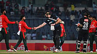 (AP Photo/Mosaraf Hossain) : New Zealand's Bevon Jacobs shakes hands with Bangladesh's players after winning the third T20 international cricket match between Bangladesh and New Zealand in Mirpur, Bangladesh, Saturday, May 2, 2026