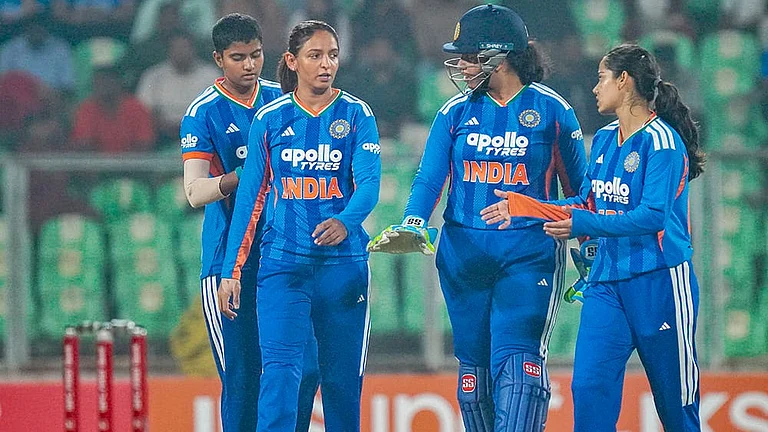 India's captain Harmanpreet Kaur with teammates during the fifth T20 International cricket match of a series between India Women and Sri Lanka Women, at Greenfield International Stadium, in Thiruvananthapuram. - | Photo: PTI