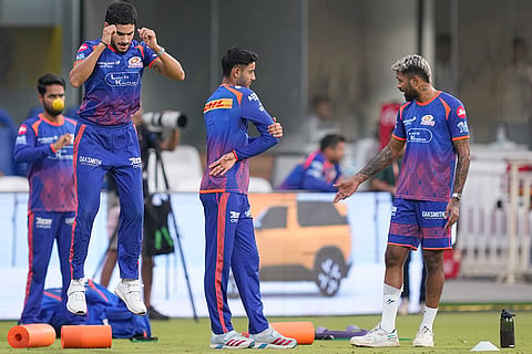 Mumbai Indians' Hardik Pandya, right, Krish Bhagat, and others, during a training session ahead of an Indian Premier League (IPL) 2026 T20 cricket match between Chennai Super Kings and Mumbai Indians, in Chennai, Tamil Nadu.