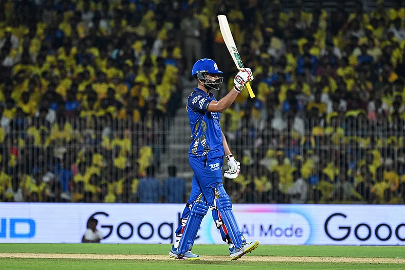 Mumbai Indians Naman Dhir celebrates his fifty runs