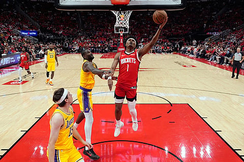 Houston Rockets guard Amen Thompson (1) shoots during the first half of Game 6 of a first-round NBA playoffs basketball series against the Los Angeles Lakers in Houston.
