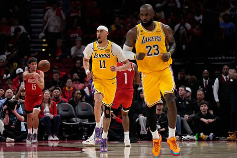 Los Angeles Lakers center Jaxson Hayes (11) celebrates during the second half of Game 6 of a first-round NBA playoffs basketball series against the Houston Rockets in Houston.