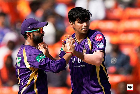 Kolkata Knight Riders' Kartik Tyagi, right and Kolkata Knight Riders' captain Ajinkya Rahane celebrate the wicket of Sunrisers Hyderabad's Abhishek Sharma during the Indian Premier League cricket match between Sunrisers Hyderabad and Kolkata Knight Riders in Hyderabad.