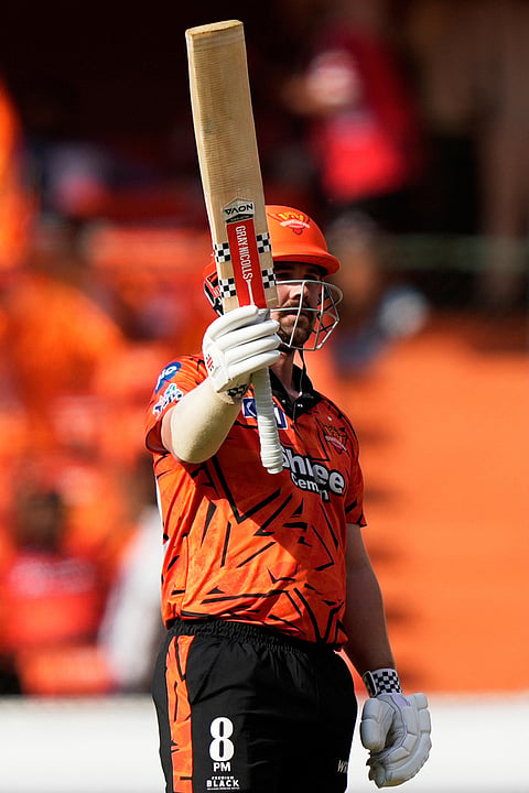 Sunrisers Hyderabad's Travis Head celebrates his fifty runs during the Indian Premier League cricket match between Sunrisers Hyderabad and Kolkata Knight Riders in Hyderabad.