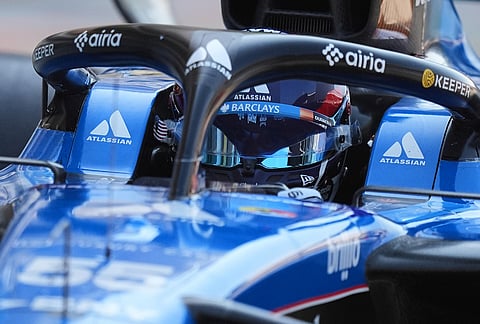 Williams driver Carlos Sainz of Spain steers his car during the qualifying session of the of the Miami Formula One Grand Prix auto race in Miami Gardens, Florida.