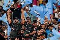 GT Vs PBKS, IPL 2026: See Best Photos From Indian Premier League Match 46 At Ahmedabad's Narendra Modi Stadium | Photo: PTI/Arun Sharma : Gujarat Titans' fans cheer ahead of the Indian Premier League (IPL) 2026 T20 cricket match between Gujarat Titans and Punjab Kings, in Ahmedabad.
