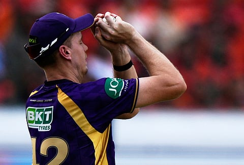 Kolkata Knight Riders' Cameron Green takes the catch to dismiss Sunrisers Hyderabad's Travis Head during the Indian Premier League cricket match between Sunrisers Hyderabad and Kolkata Knight Riders in Hyderabad.