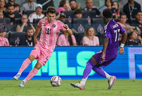 Inter Miami defender Facundo Mura (4) and Orlando City forward Iván Angulo (77) battle for the ball in the second half during an MLS soccer match against the Orlando City, in Miami.