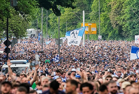 FC Schalke 04 supporters march to the stadium ahead of their 2. Bundesliga match against Fortuna Duesseldorf, where their club can secure early promotion back to the Bundesliga with a win in the evening at the Arena in Gelsenkirchen, Germany.