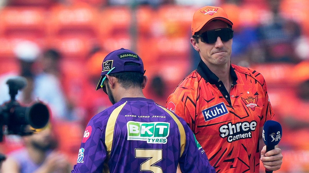 Sunrisers Hyderabad's Pat Cummins, right and Kolkata Knight Riders' captain Ajinkya Rahane shake hands after the coin toss during the Indian Premier League cricket match between Sunrisers Hyderabad, India, Sunday, May 3, 2026 - (AP Photo/Mahesh Kumar A.)