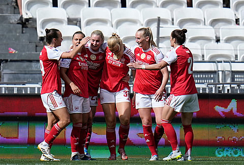 Arsenal players celebrate after Alessia Russo, 3rd left, scored their side's first goal during the Women's Champions League semifinal, second leg, soccer match between OL Lyonnes and Arsenal, in Decines, outside Lyon, France.