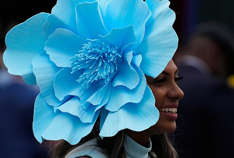 A woman wears a hat before the 152nd running of the Kentucky Derby horse race at Churchill Downs, in Louisville, Kentucky.