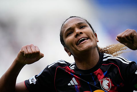 Lyonnes' Wendie Renard celebrates at the the end of the Women's Champions League semifinal, second leg, soccer match between OL Lyonnes and Arsenal, in Decines, outside Lyon, France.