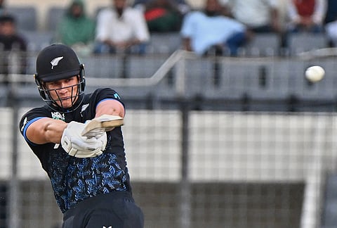 New Zealand's Bevon Jacobs plays a shot during the third T20 international cricket match between Bangladesh and New Zealand in Mirpur, Bangladesh.